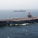 1280px-US_Navy_000722-N-7412M-005_USS_Eisenhower_^_USS_George_Washington